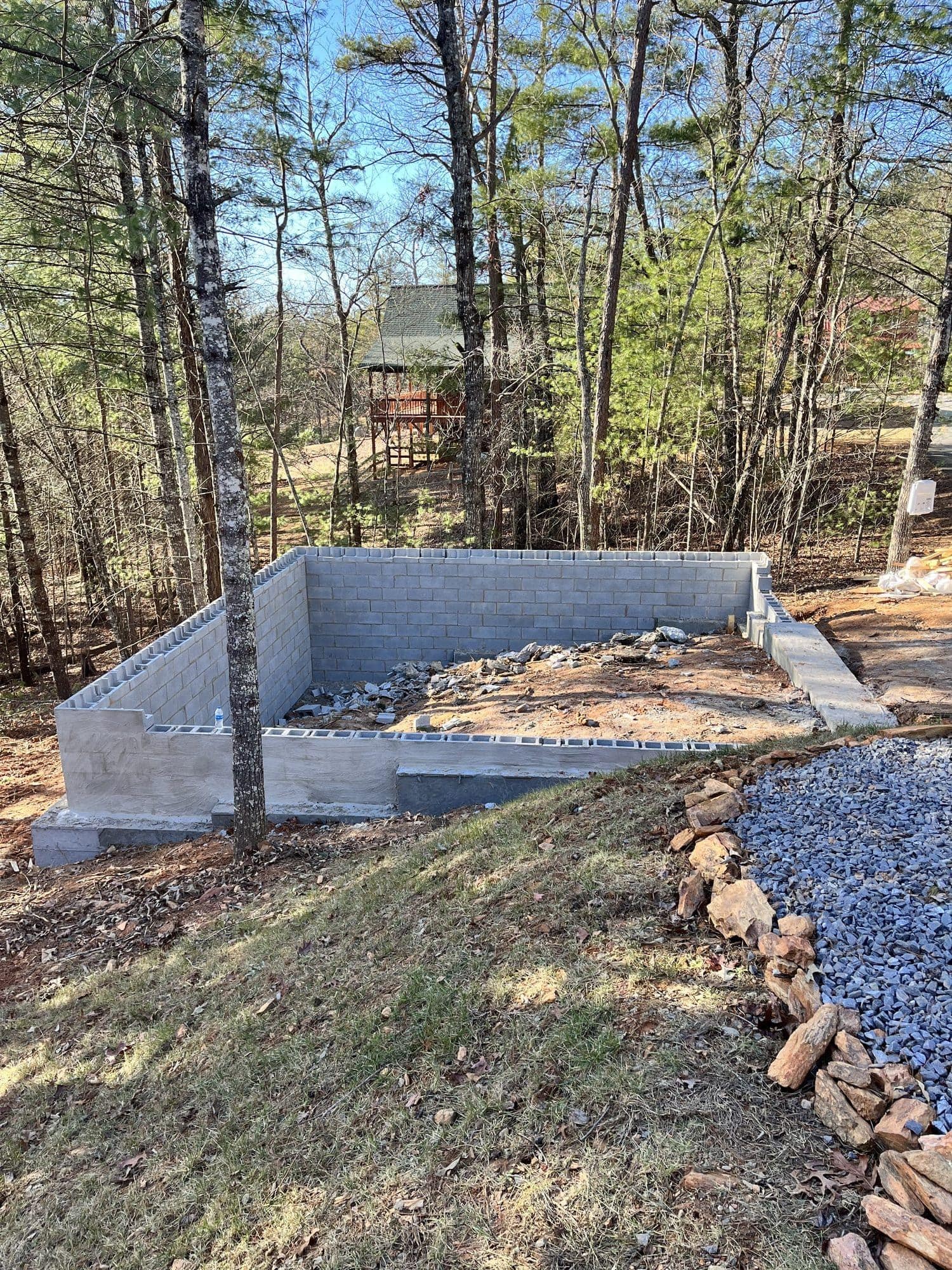 Concrete block foundation walls on a graded site